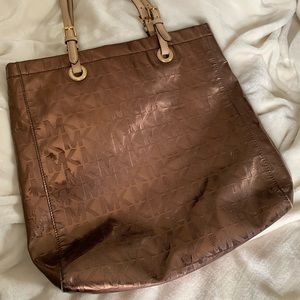 Michael Kors brown tote . Leather straps